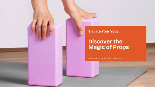 "Hands using pink yoga blocks showcasing the benefits of props in practice"