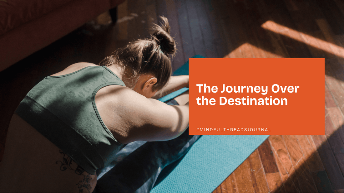 Woman practicing yoga pose on mat with text overlay "The Journey Over the Destination" promoting mindfulness.