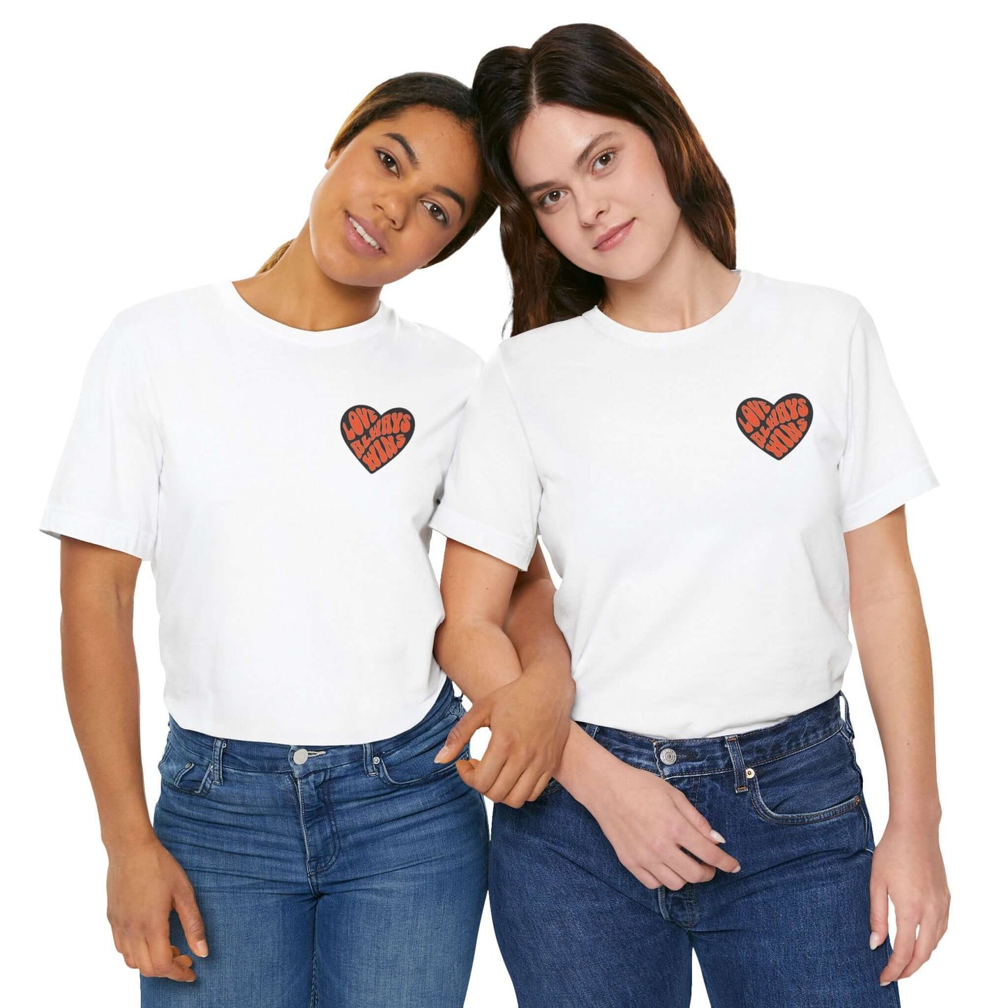 Two people wearing white Spread the Yoga Love unisex tees with heart design, showcasing yoga-inspired style and comfort.