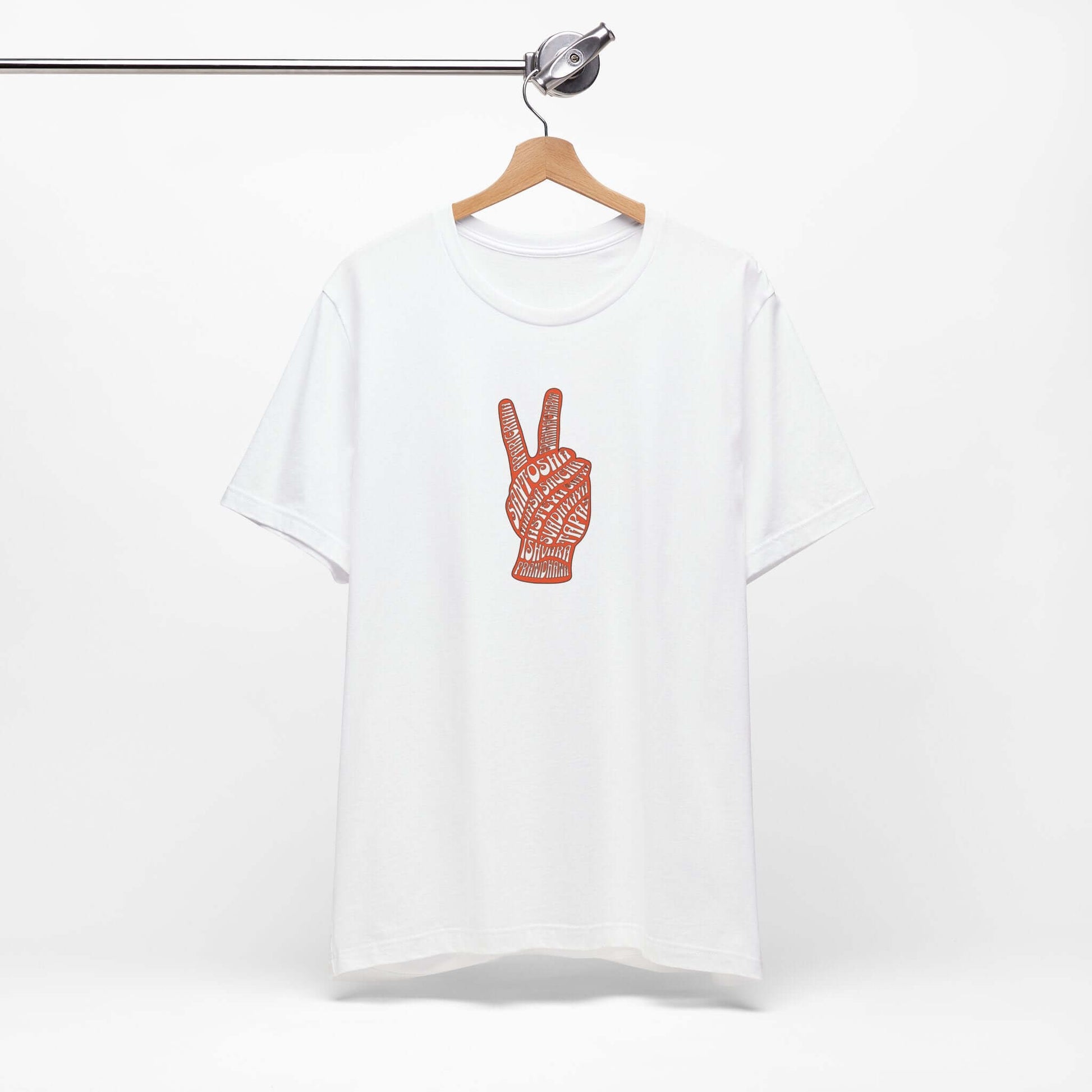 White unisex tee with peace sign design featuring yamas and niyamas, perfect for yoga enthusiasts.