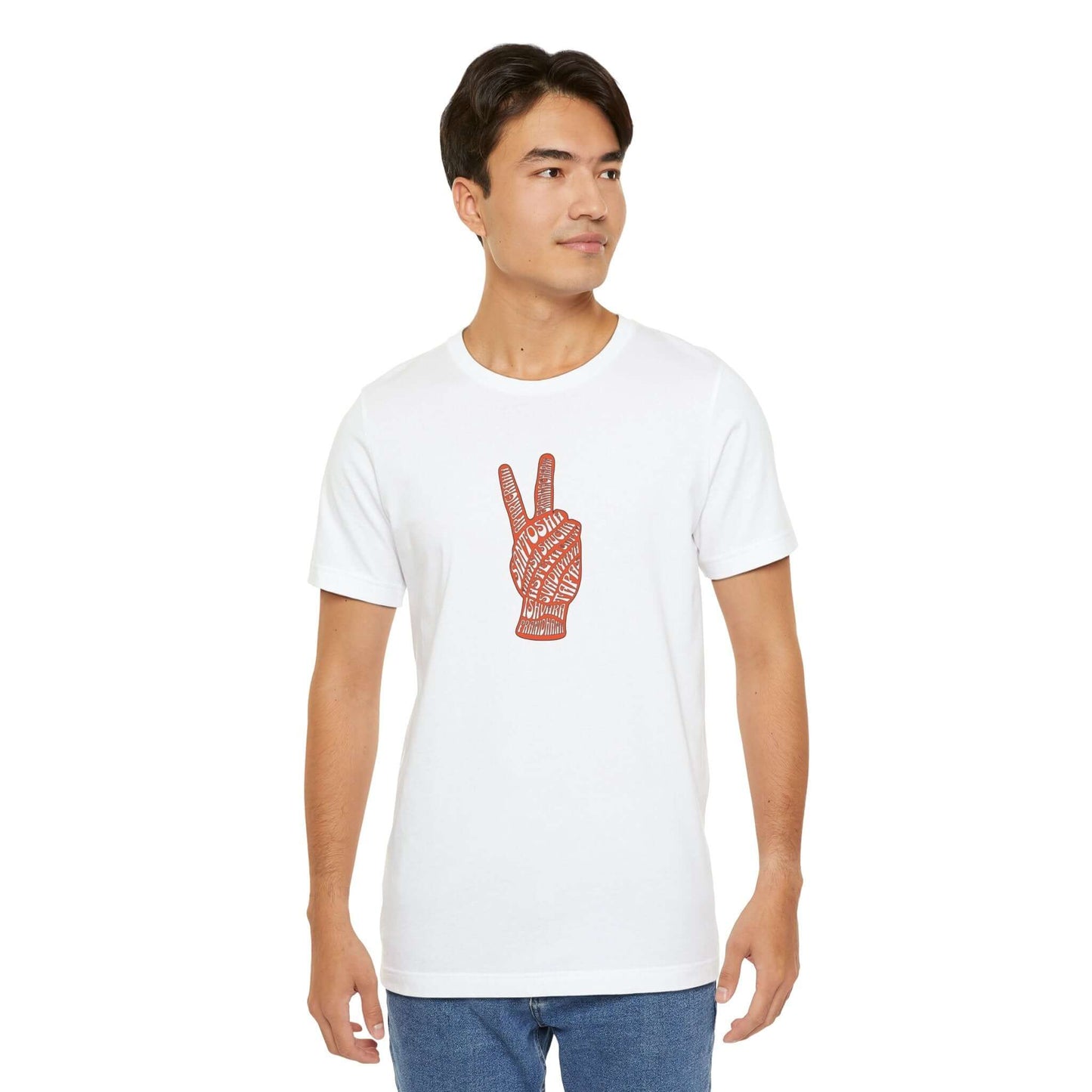 Unisex yoga tee with yamas and niyamas design, perfect for yoga enthusiasts, 100% cotton, worn by a man, showcasing a peace hand symbol.