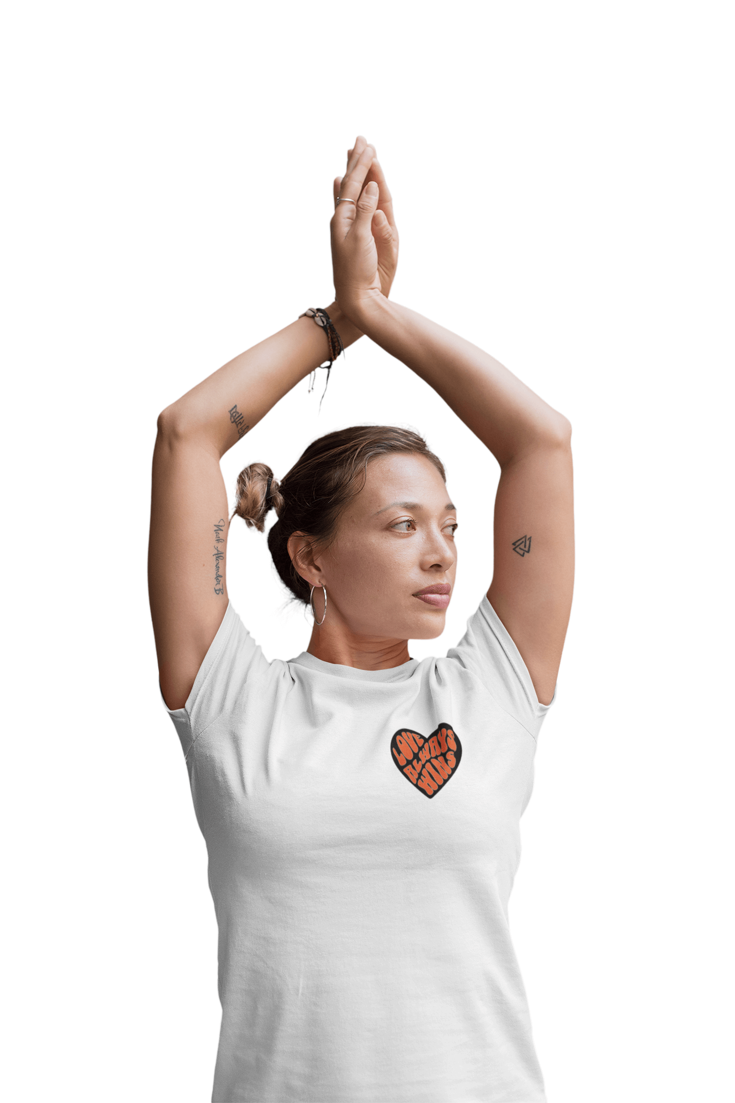 Unisex yoga t-shirt with heart design, perfect for yoga practice and mindfulness, worn by person with arms raised.